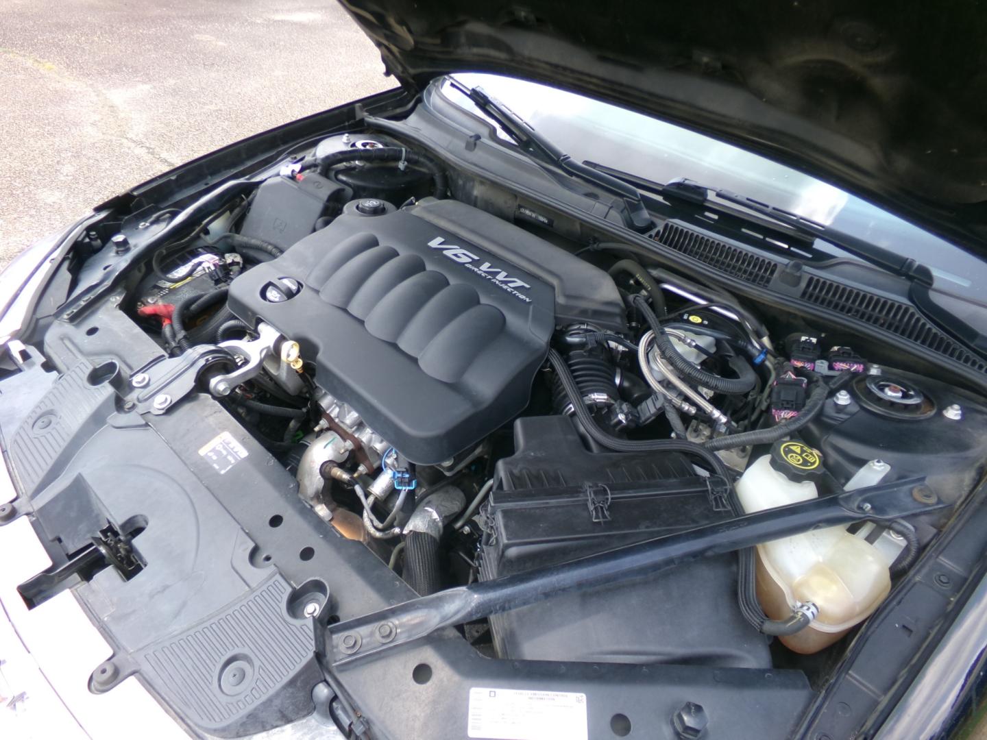2014 Black /Gray Chevrolet Impala LT (2G1WB5E35E1) with an 3.6L V6 DOHC 16V FFV engine, 6-Speed Automatic transmission, located at 401 First NE, Bearden, AR, 71720, (870) 687-3414, 33.726528, -92.611519 - Photo#5